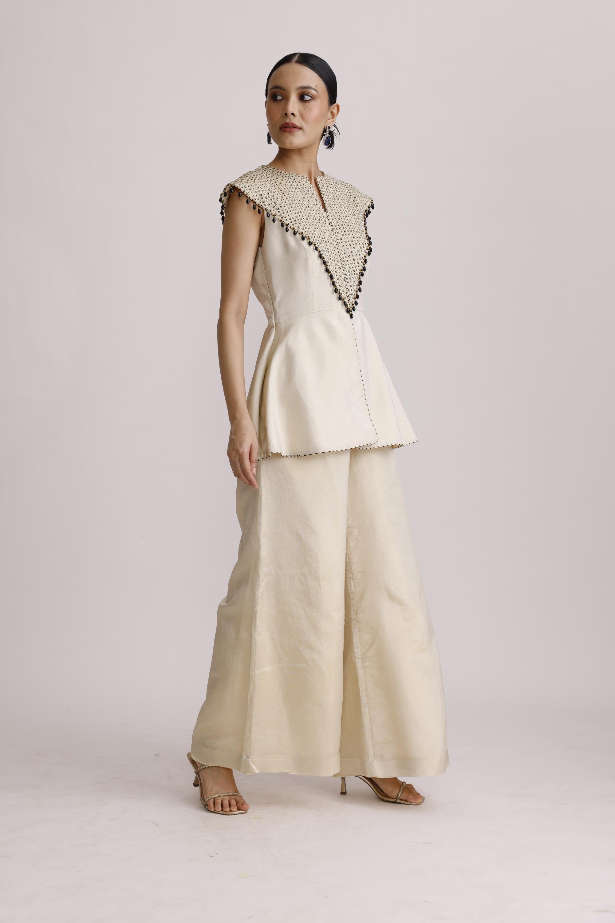 IVORY PAPLUM TOP WITH STRAIGHT PANTS