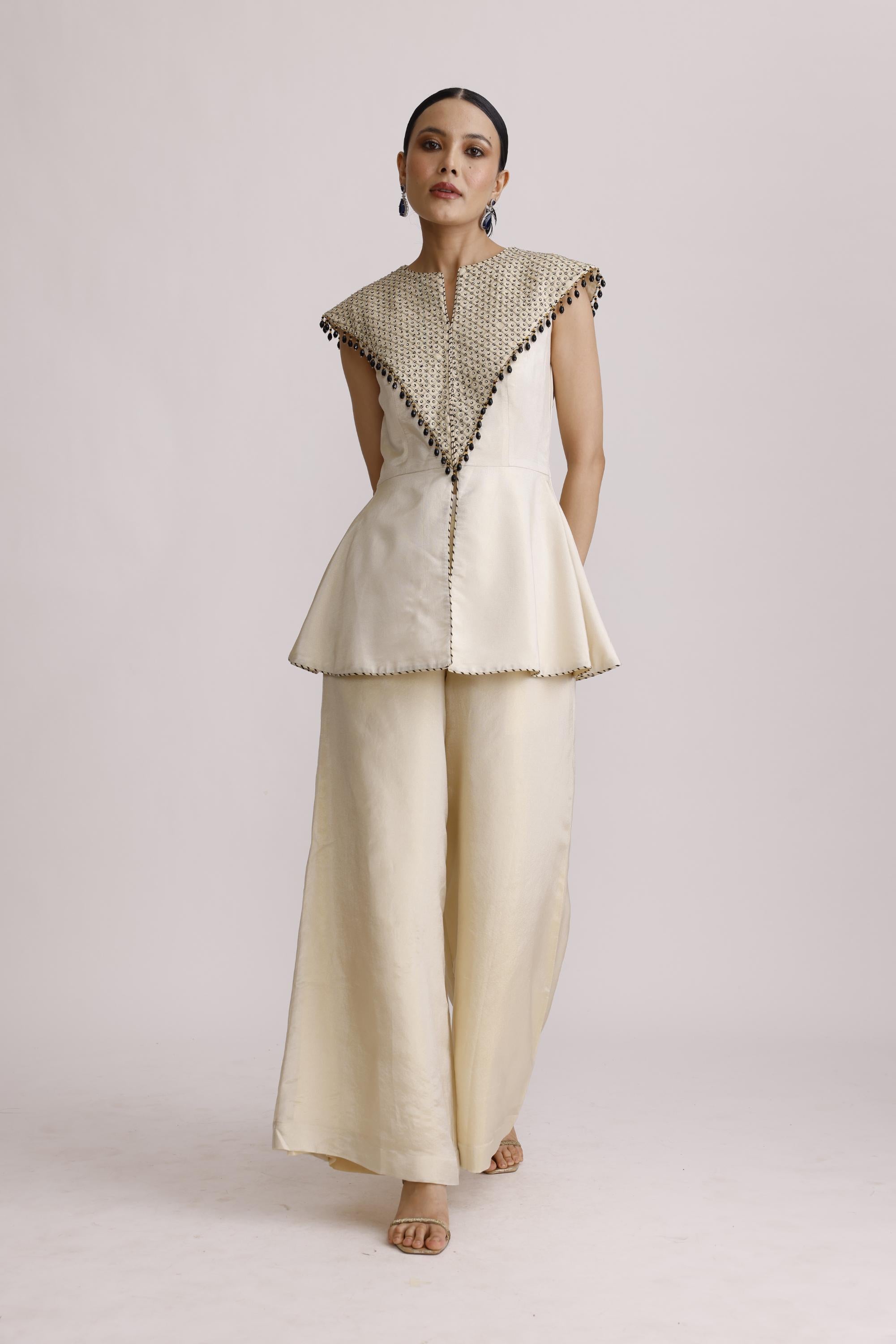 IVORY PAPLUM TOP WITH STRAIGHT PANTS