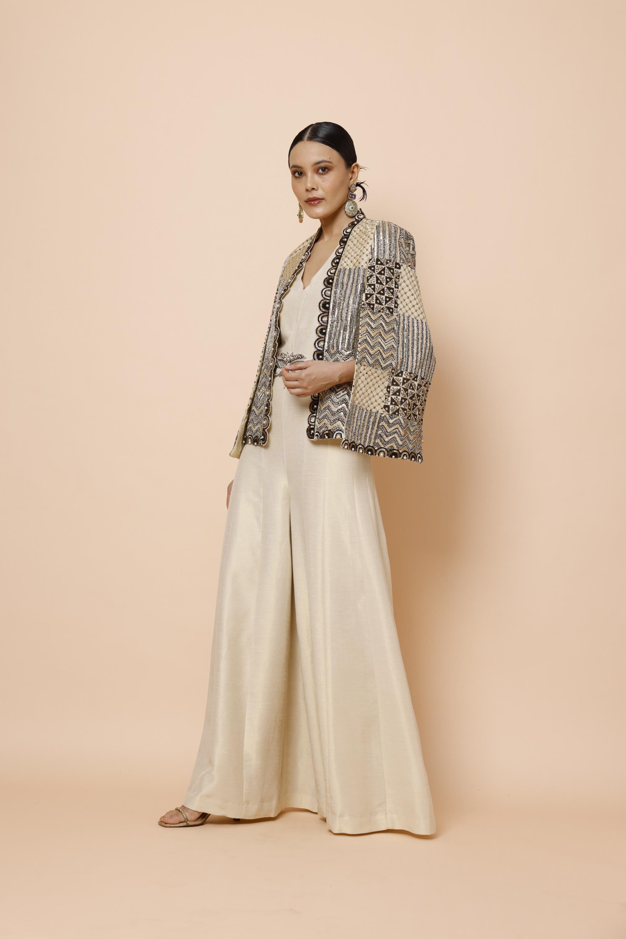 IVORY JUMPSUIT WITH BELT AND CAPE JACKET