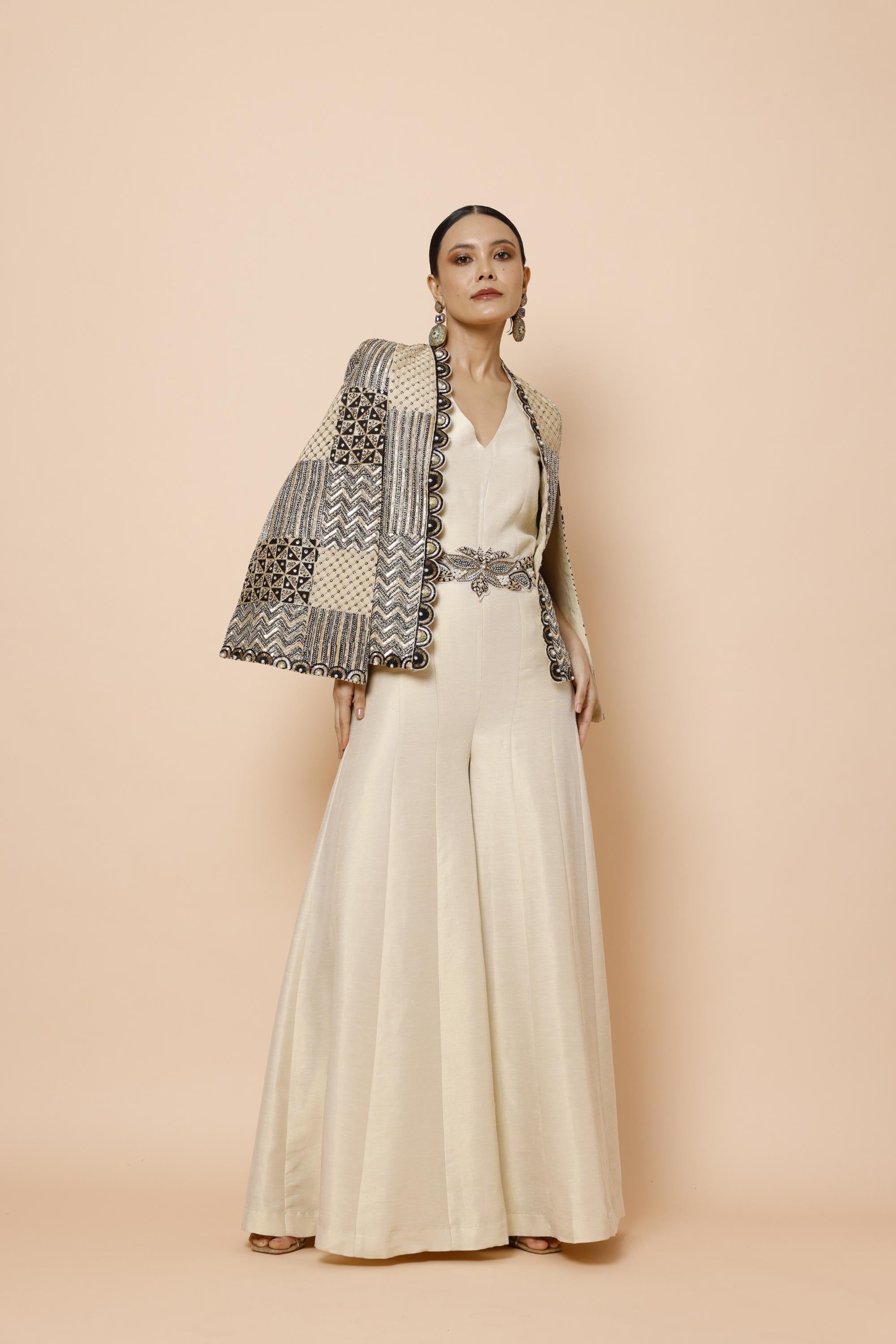IVORY JUMPSUIT WITH BELT AND CAPE JACKET