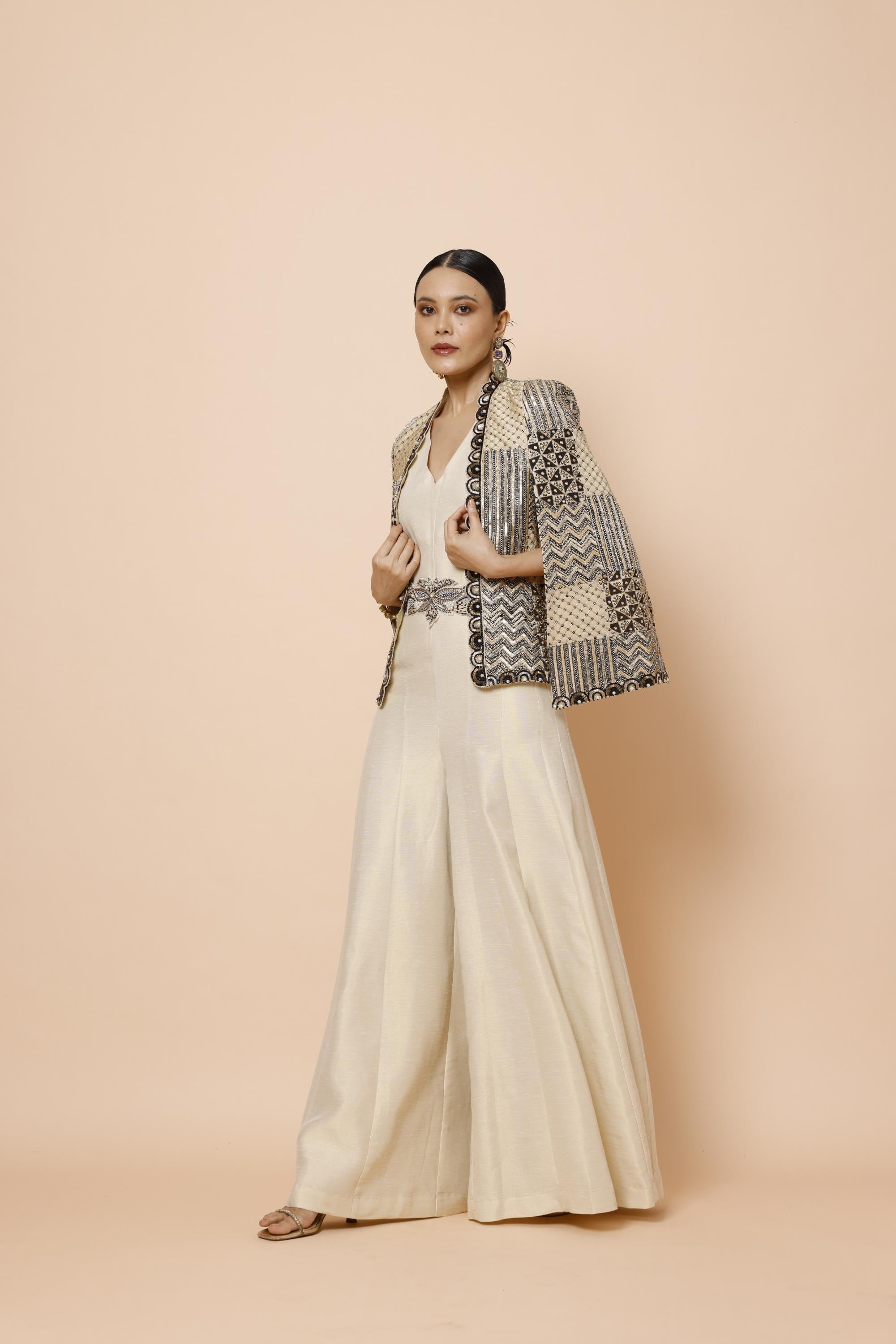 IVORY JUMPSUIT WITH BELT AND CAPE JACKET