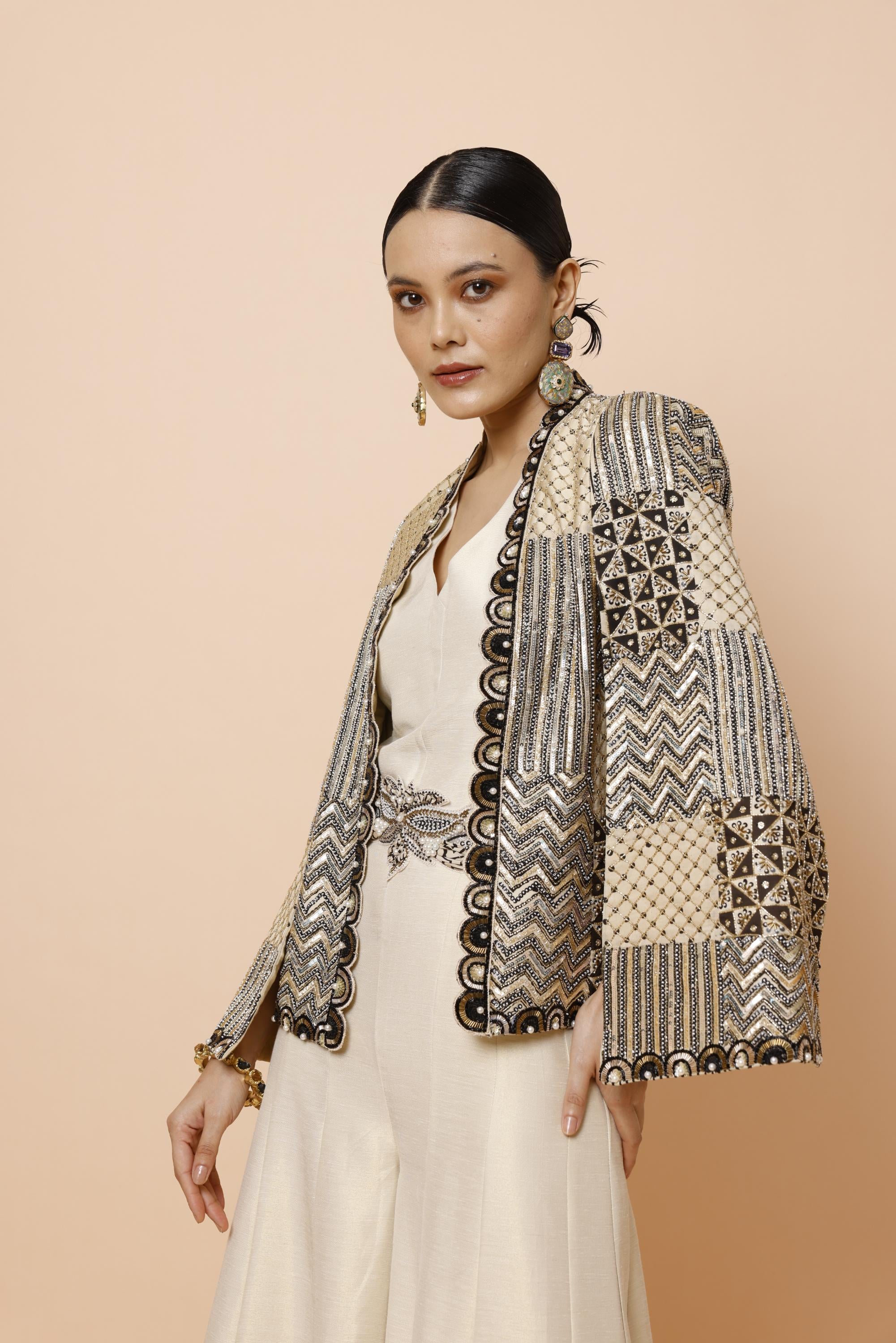 IVORY JUMPSUIT WITH BELT AND CAPE JACKET