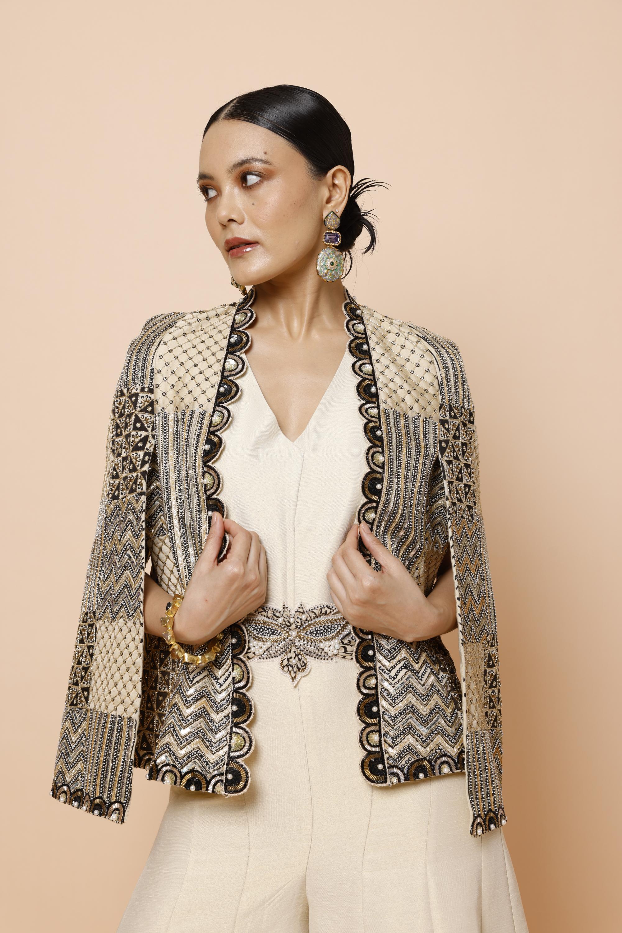 IVORY JUMPSUIT WITH BELT AND CAPE JACKET