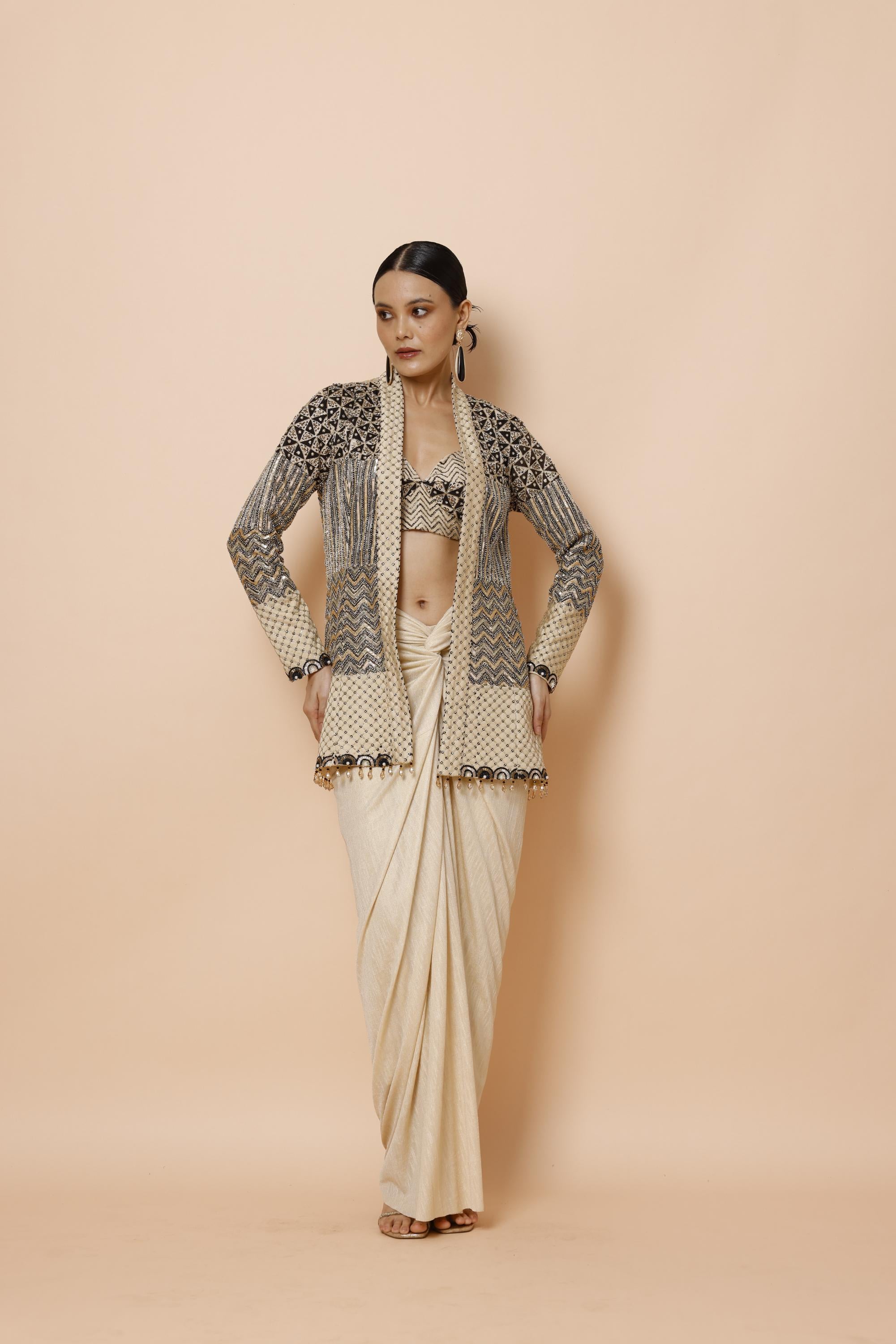 IVORY BRALETTE PAIRED WITH JACKET AND DRAPE SKIRT