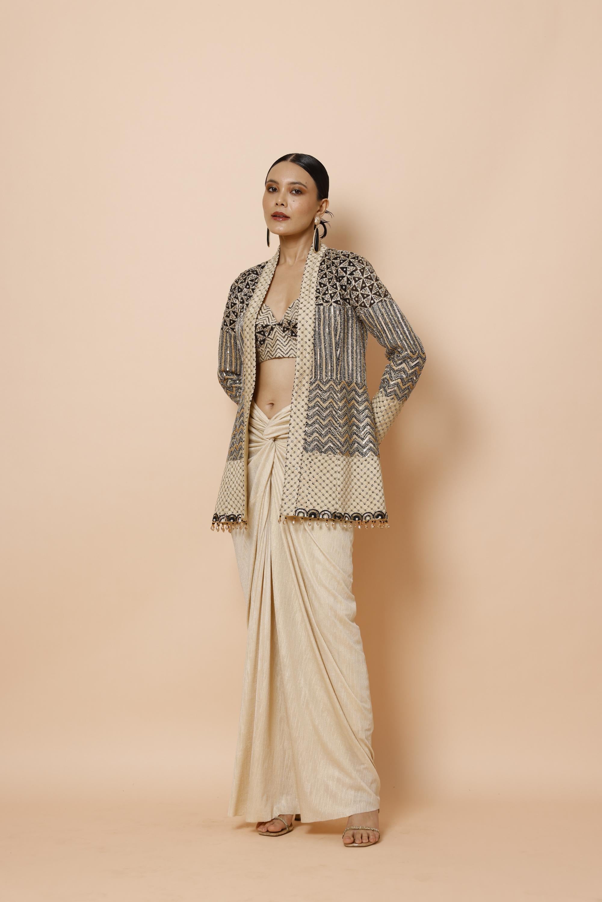 IVORY BRALETTE PAIRED WITH JACKET AND DRAPE SKIRT