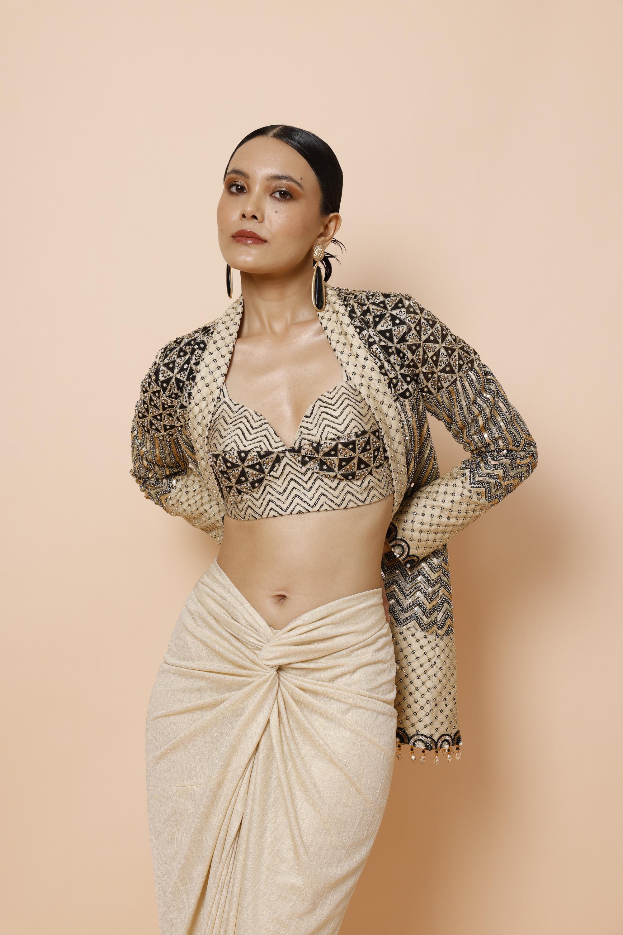 IVORY BRALETTE PAIRED WITH JACKET AND DRAPE SKIRT