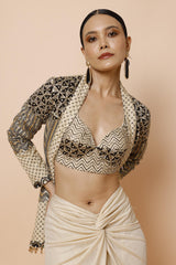 IVORY BRALETTE PAIRED WITH JACKET AND DRAPE SKIRT
