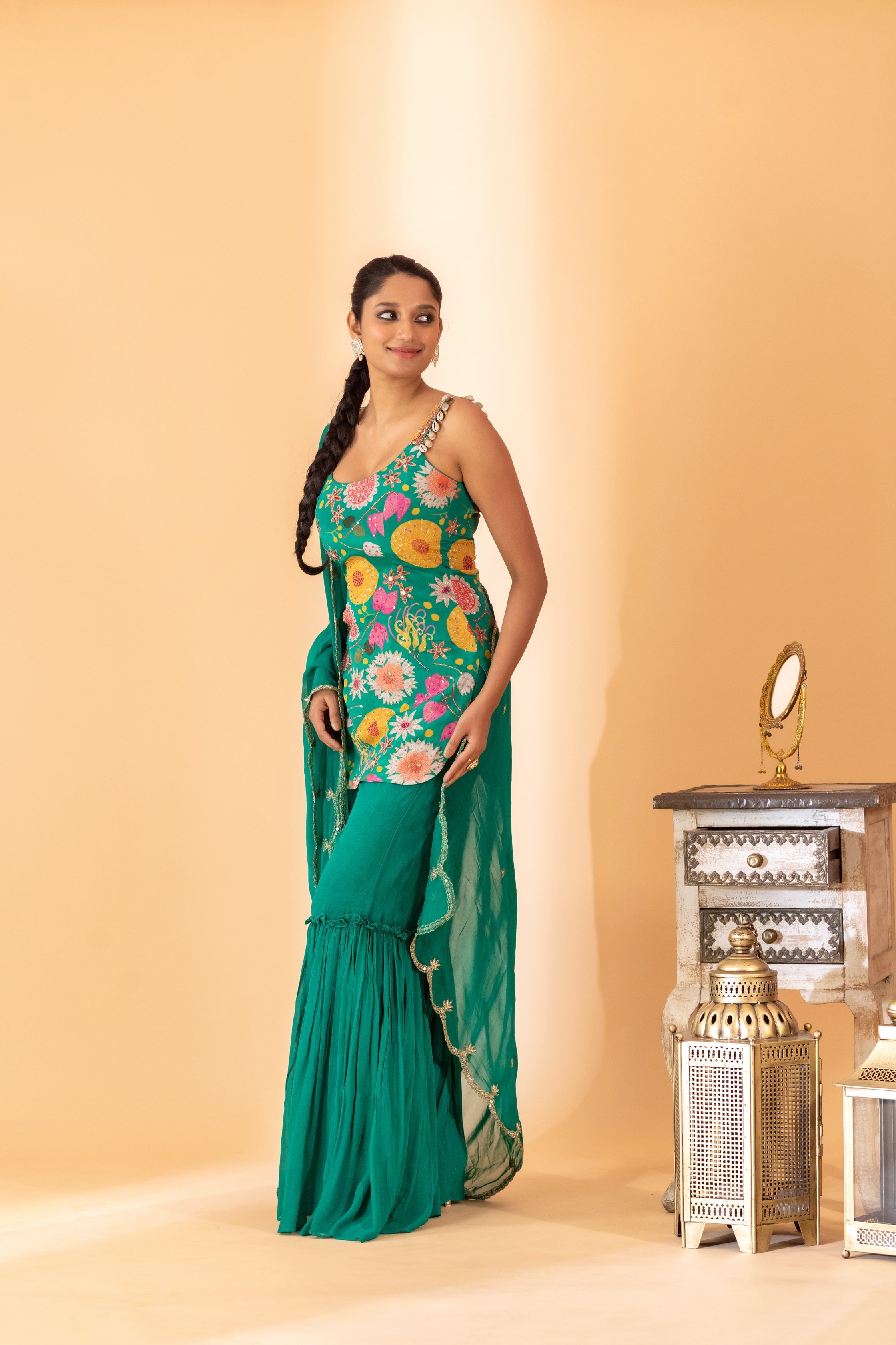 A embroidered sharara set with kurti and duptta