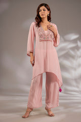 Kurta in crepe base with thread, cutdana and mirror embroidery.