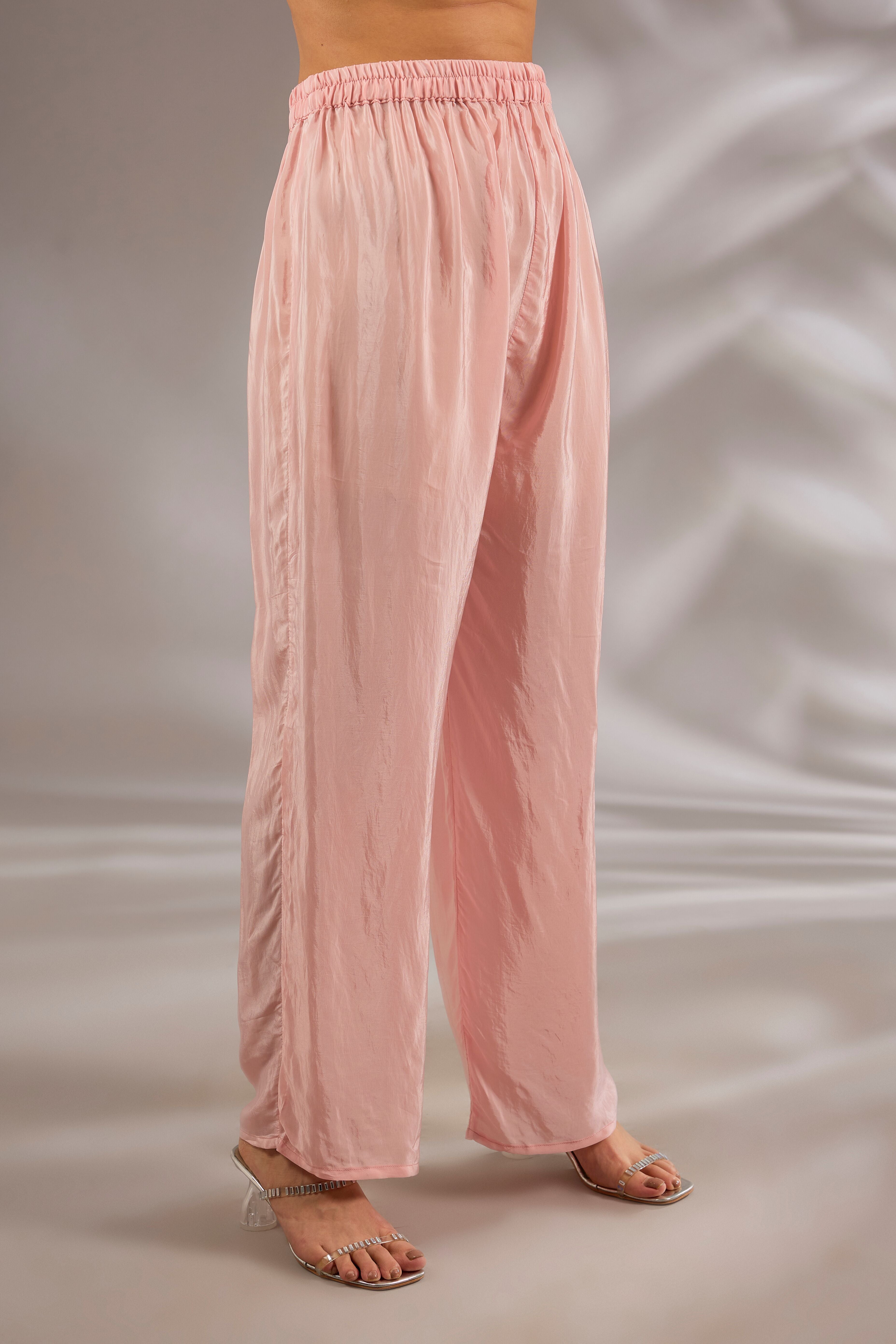 Kurta in crepe base with thread, cutdana and mirror embroidery.