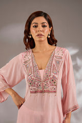 Kurta in crepe base with thread, cutdana and mirror embroidery.