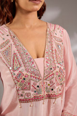 Kurta in crepe base with thread, cutdana and mirror embroidery.