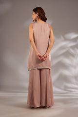 Sharara set in satin organza base with a kurta and dupatta hand and machine embroidered