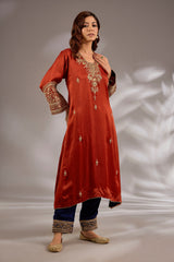 A-line kurta in satin organza base with dori hand embroidery.