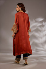 A-line kurta in satin organza base with dori hand embroidery.