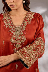 A-line kurta in satin organza base with dori hand embroidery.