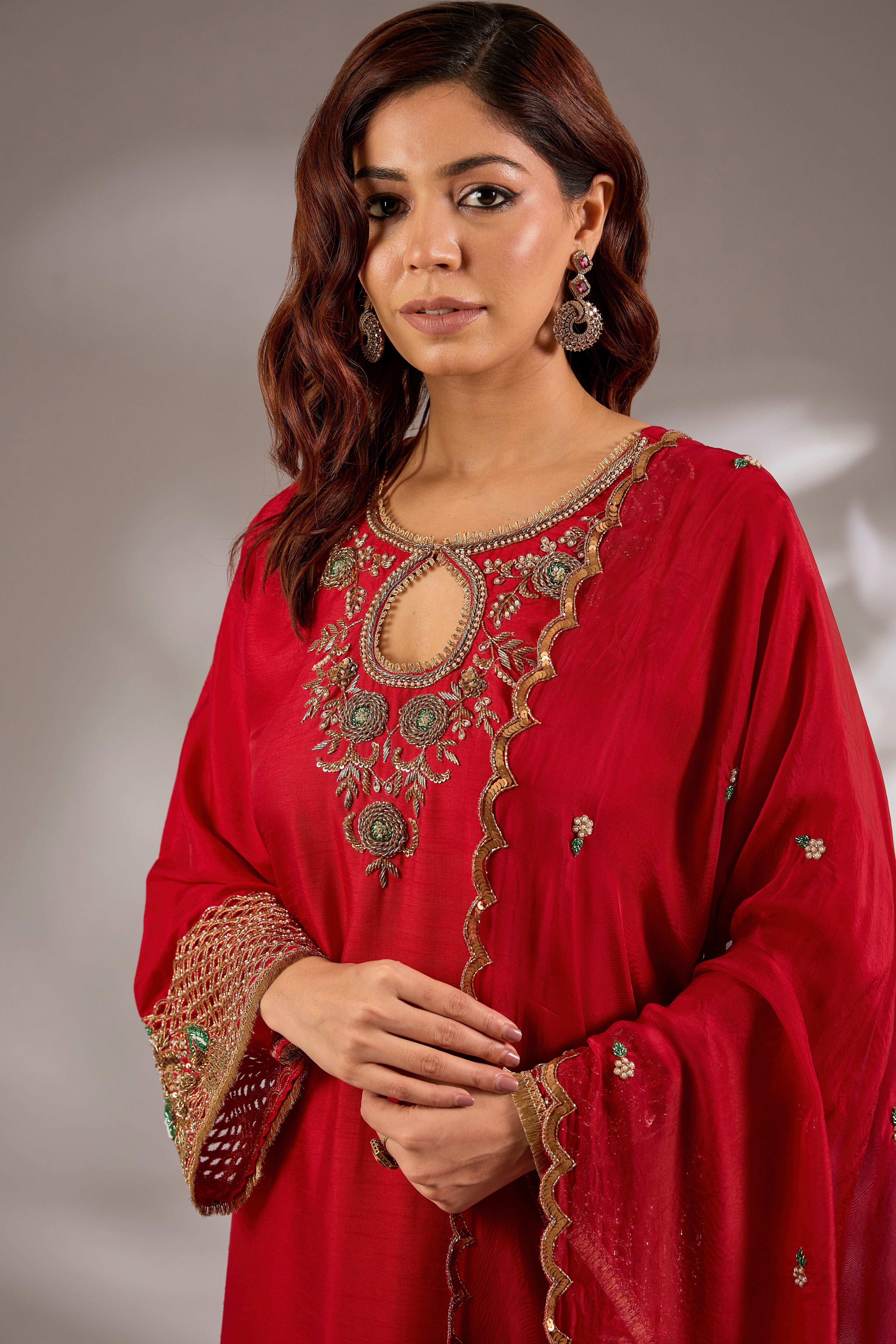 Straight kurta in silk base with hand embroidery.