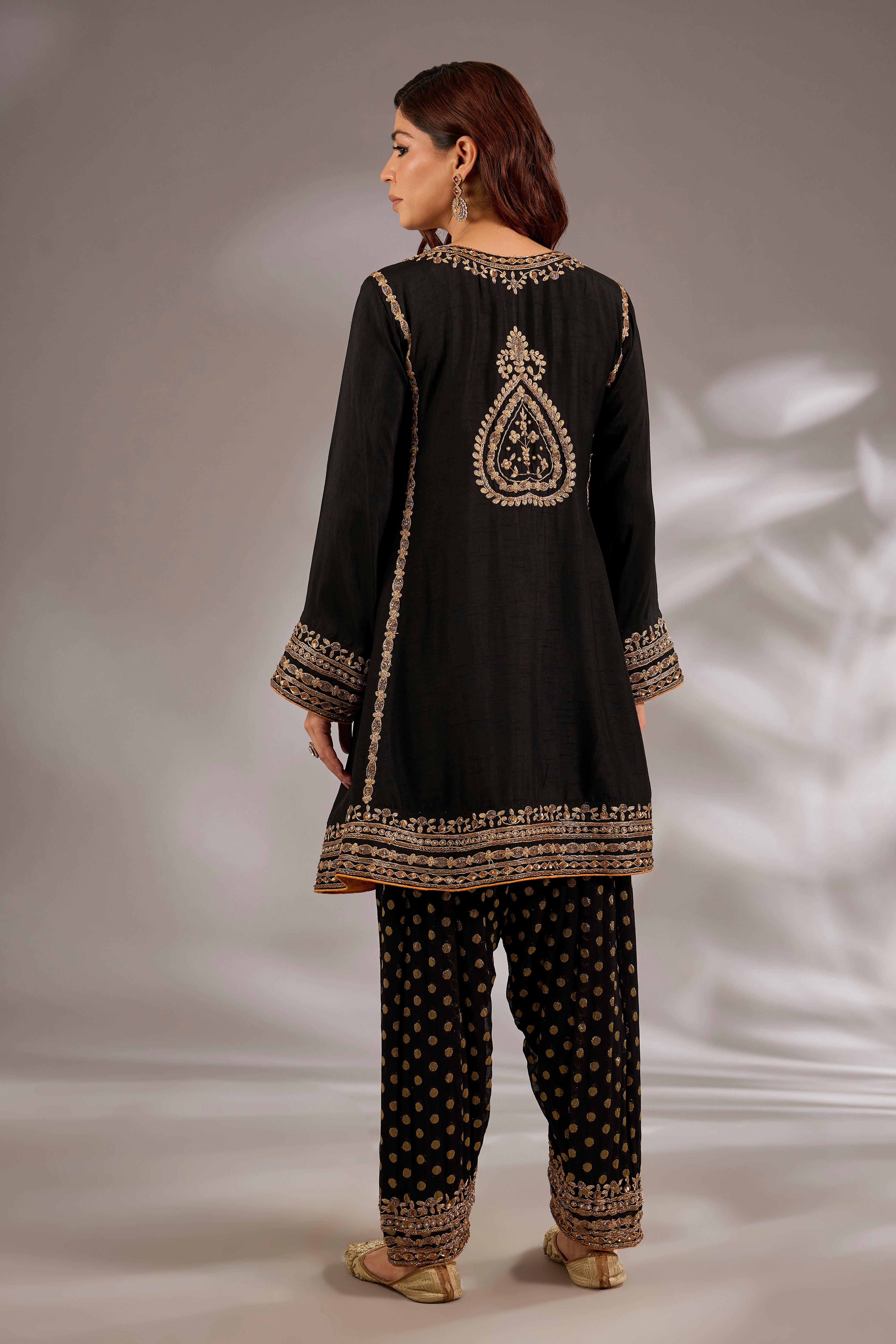 Short anarkali in silk base with dori hand embroidery.