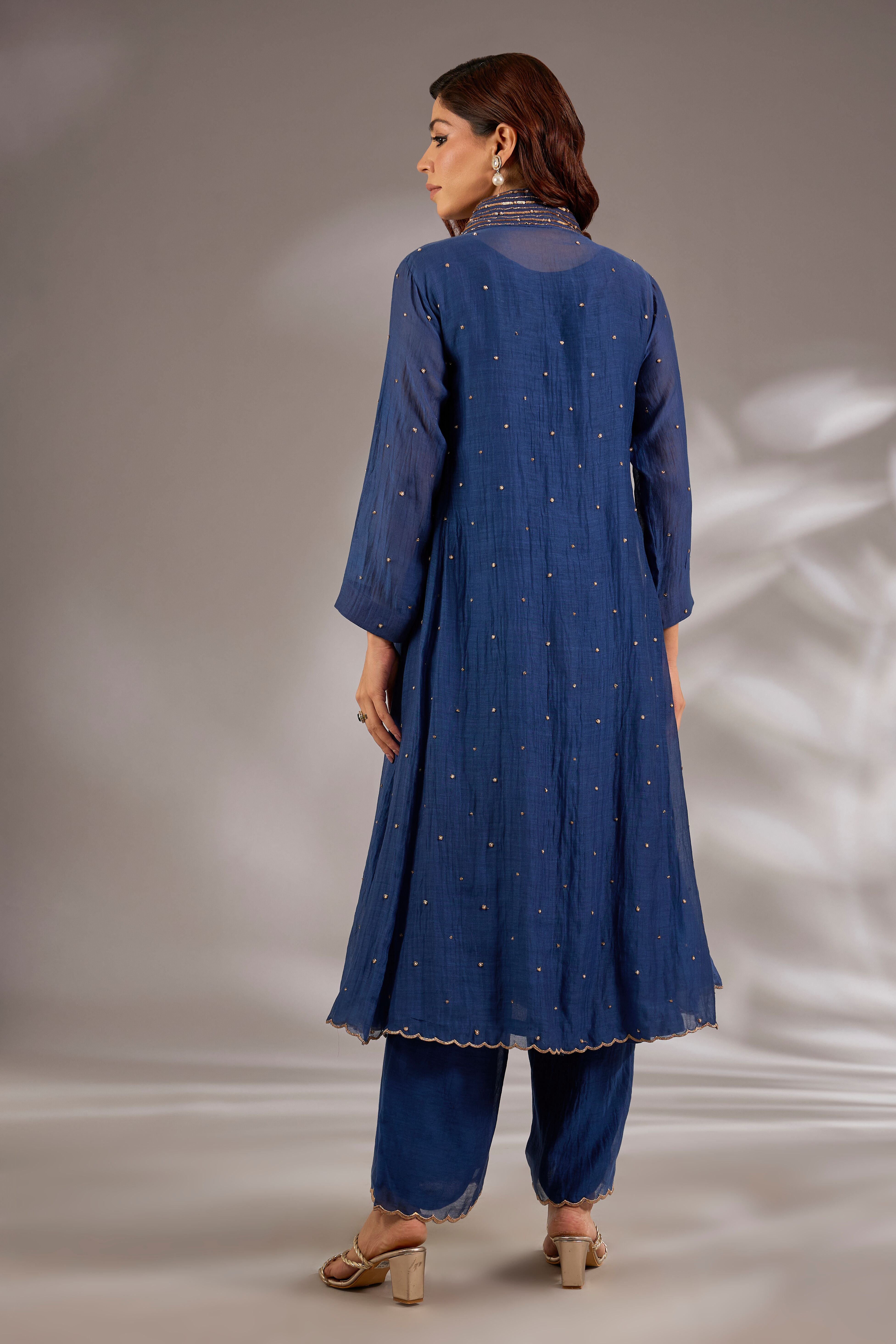 Anarkali in mul chanderi base with hand embroidery.