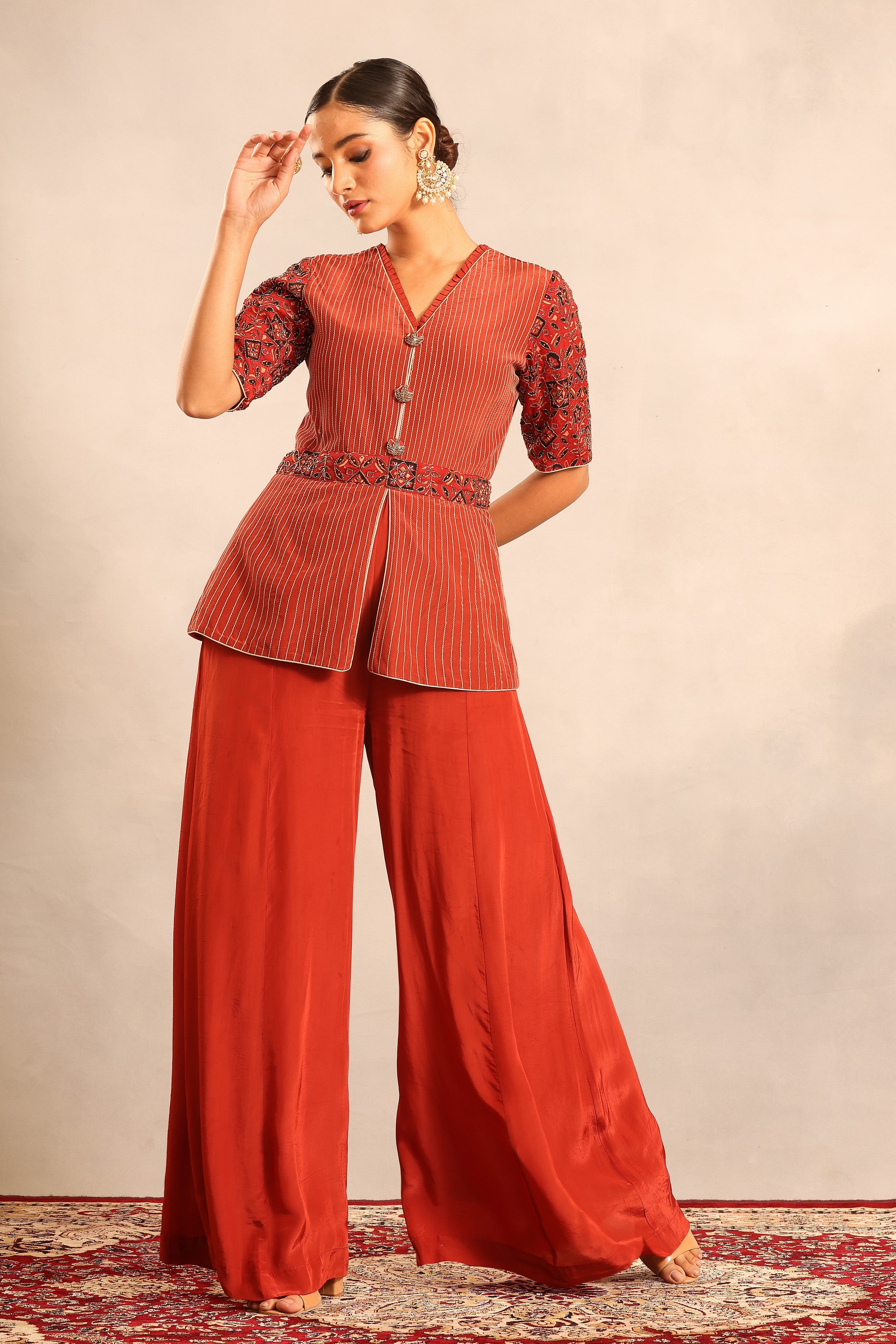Red ajrakh embroidered runner peplum top with pants