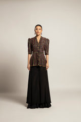 Delectable peplum top with black flare pants