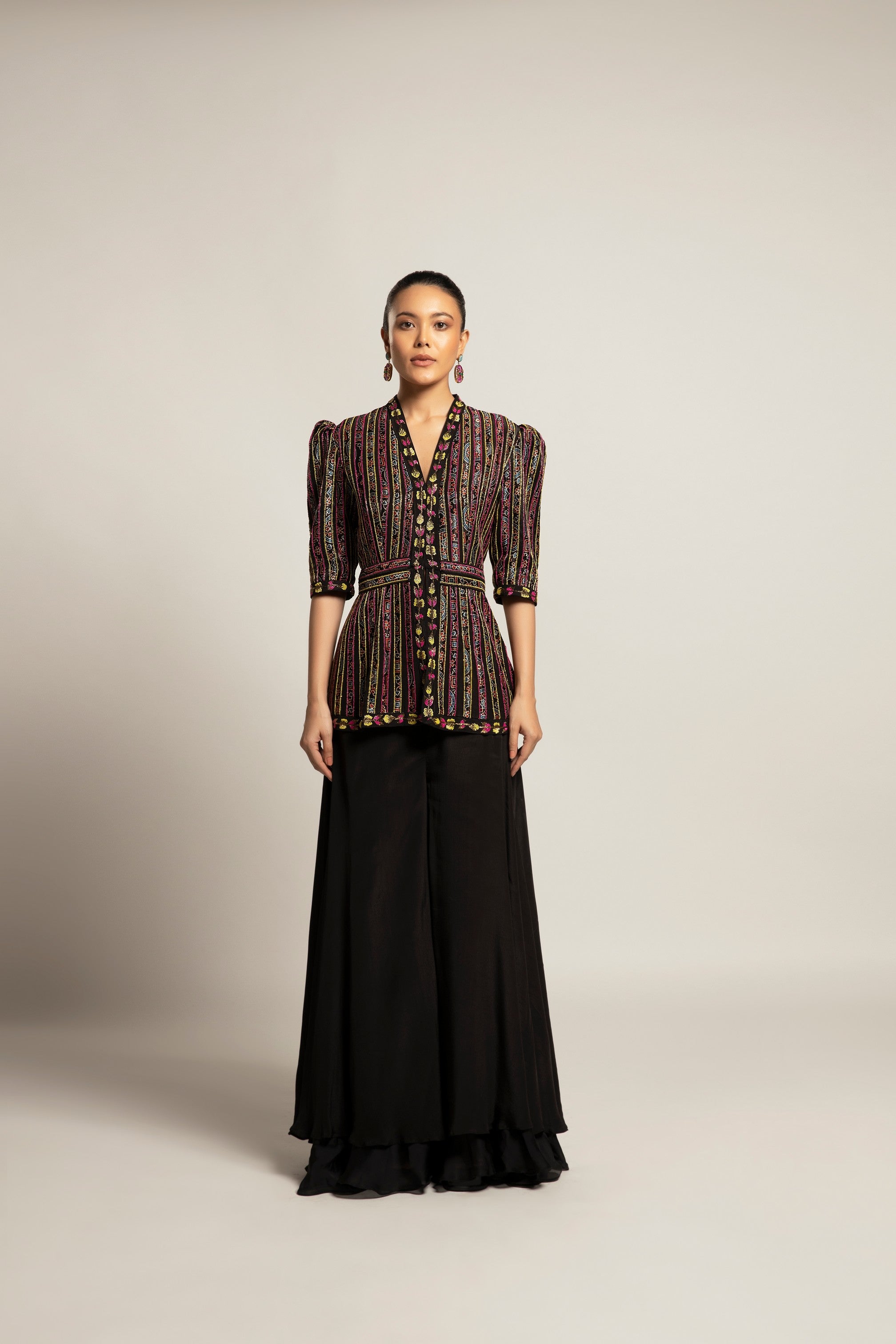 Delectable peplum top with black flare pants