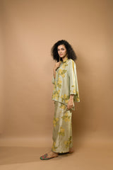 Pistag rosettes block-printed asymmetrical hem shirt