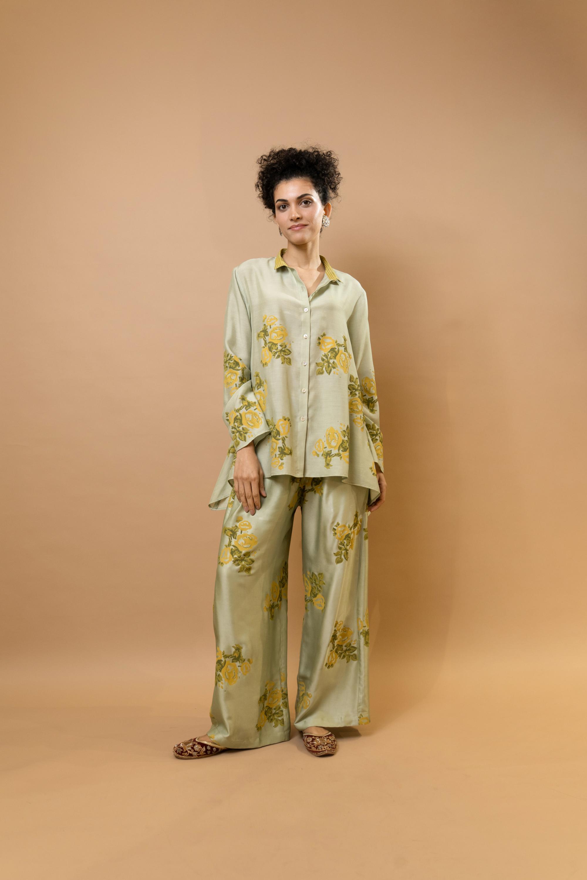 Beige rosettes block-printed asymmetrical hem shirt