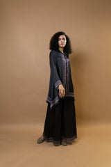 A black bold and stylish block-printed asymmetric shirt,