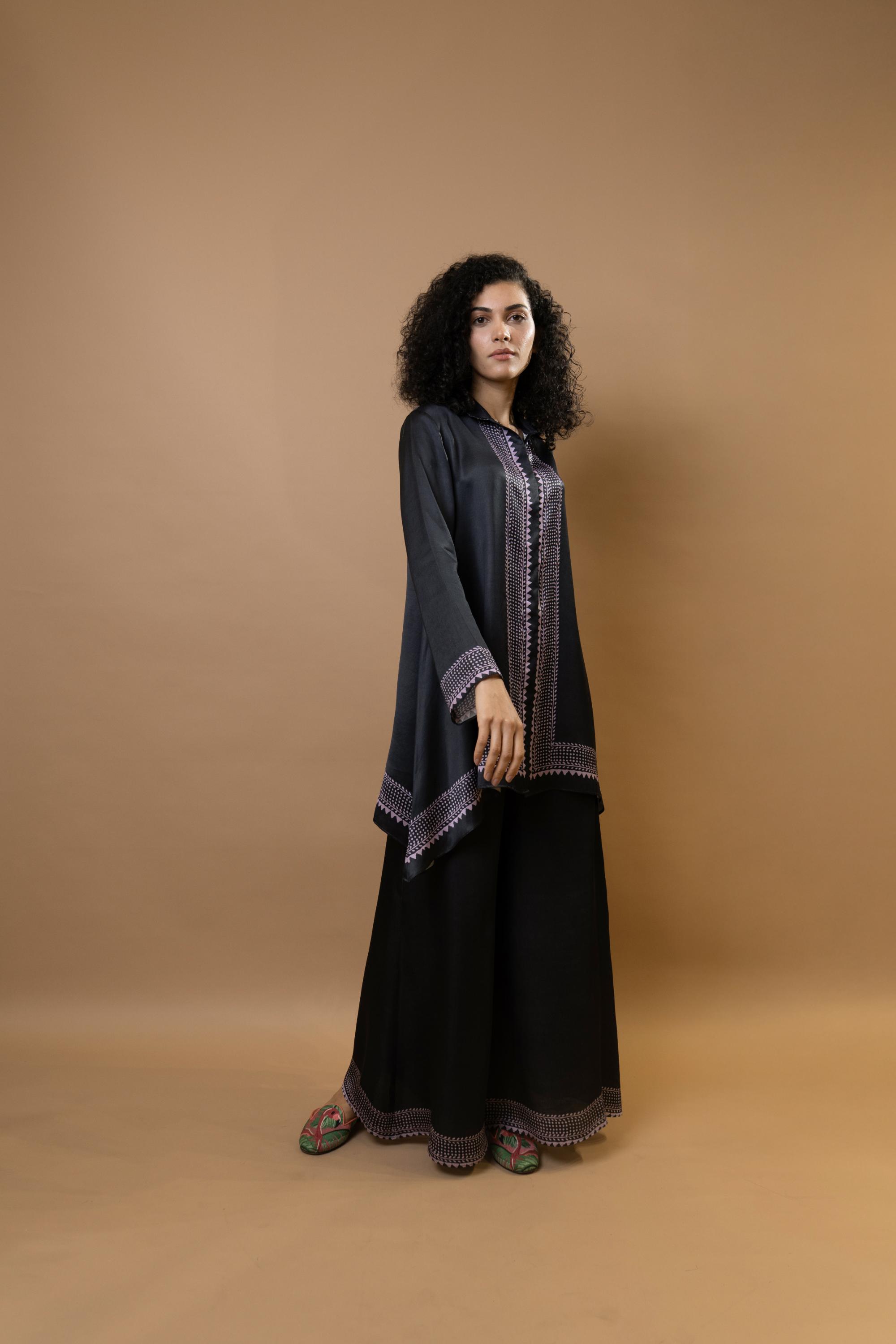A black bold and stylish block-printed asymmetric shirt,