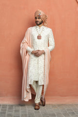IVORY RAW SILK EMBROIDERED SHERWANI WITH MONGA TASSAR SILK KURTA AND CHURIDAR