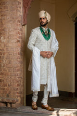 IVORY TAFETTA ACHKAN AND BELT ALL OVER EMBROIDERED WITH MONGA KURTA AND CHURIDAR
