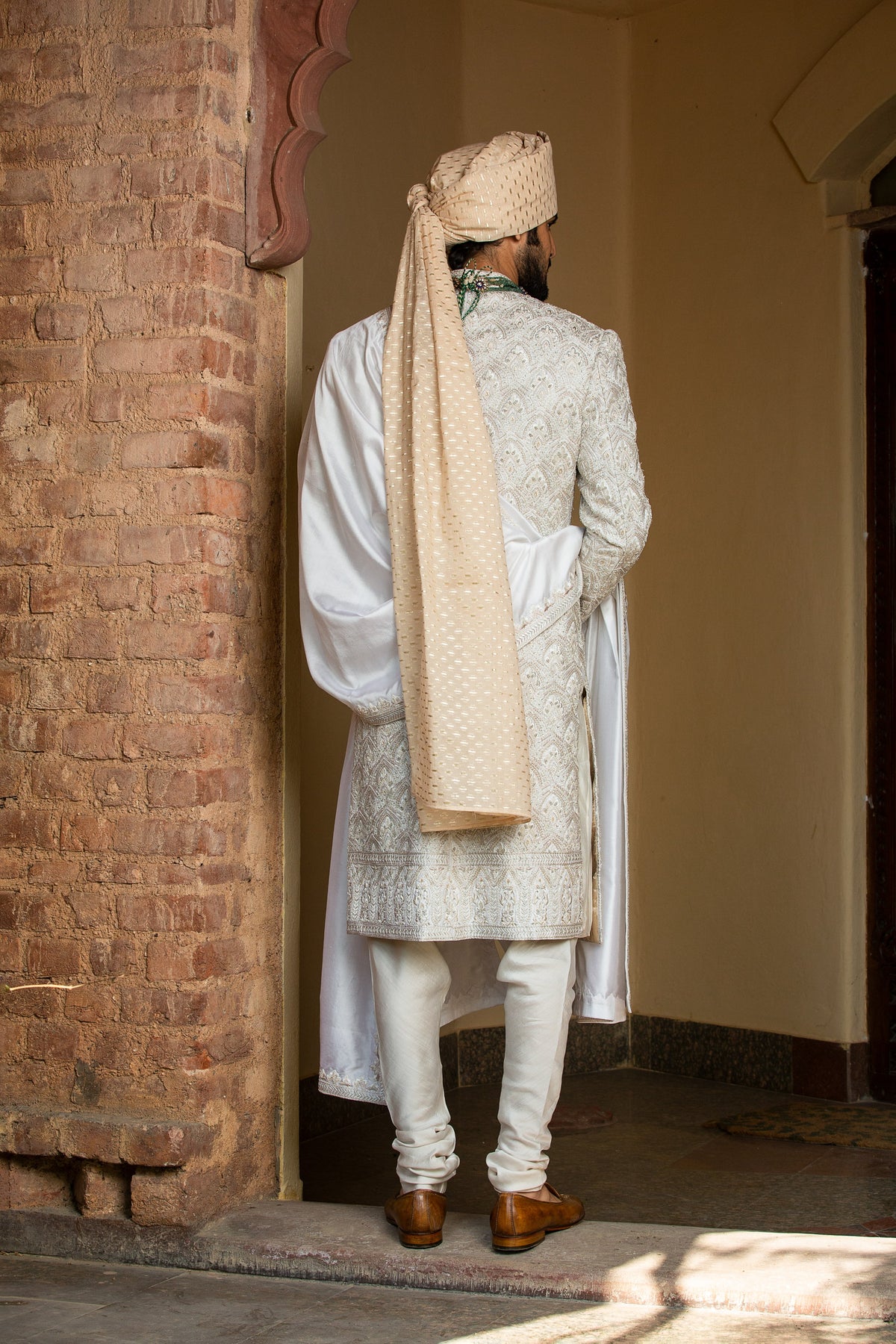 IVORY TAFETTA ACHKAN AND BELT ALL OVER EMBROIDERED WITH MONGA KURTA AND CHURIDAR