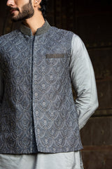 STEEL GREY KURTA AND PANT WITH ALL OVER EMBROIDERED RAW SILK NEHRU JACKET