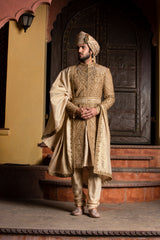 GOLD RAW SILK ANTIQUE EMBROIDERED ACHKAN WITH BELT AND KURTA + CHURIDAR