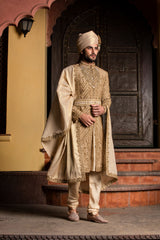GOLD RAW SILK ANTIQUE EMBROIDERED ACHKAN WITH BELT AND KURTA + CHURIDAR