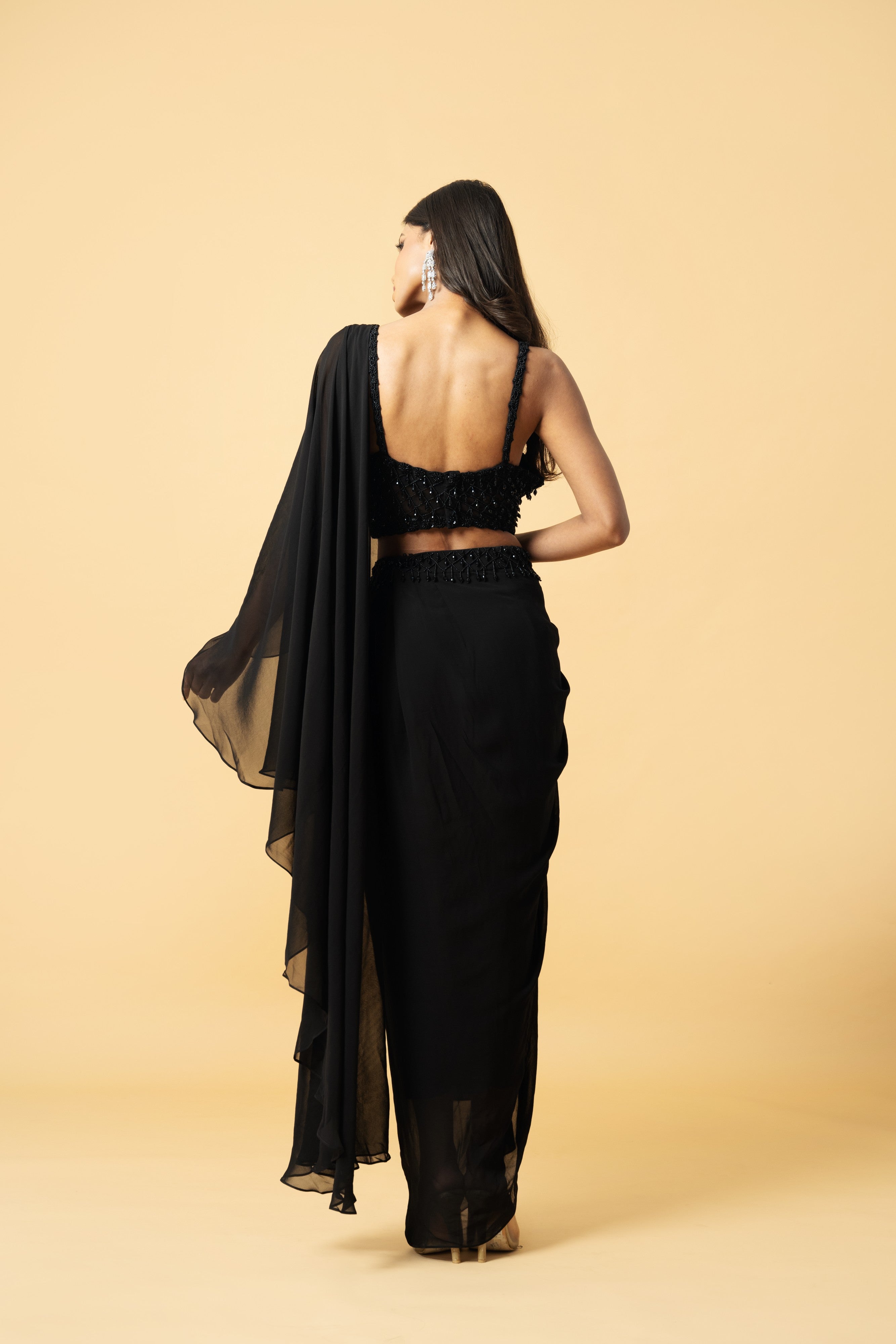 Black georgette saree with hand embroidered blouse