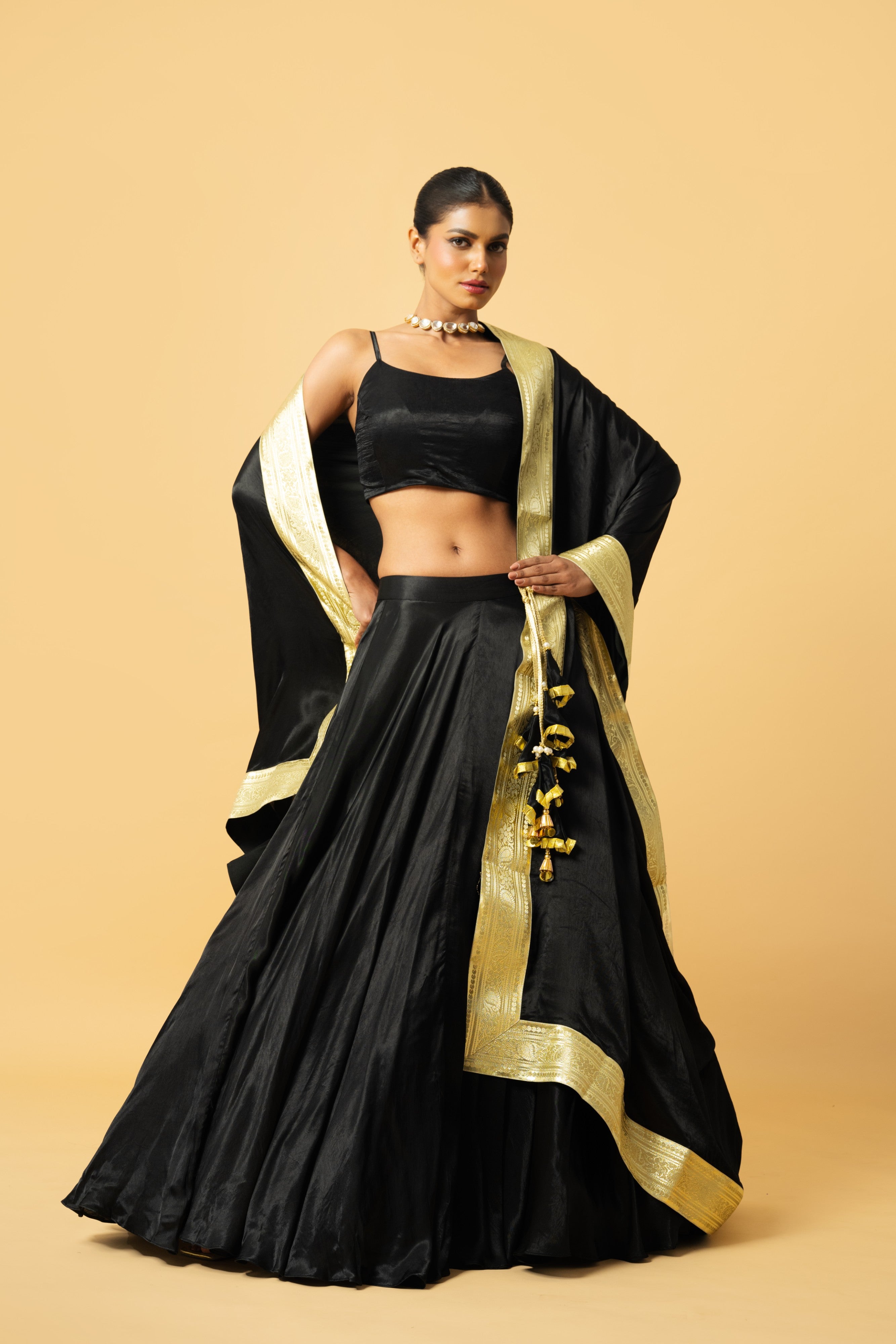 Black modal satin lehenga with golden lace in dupatta