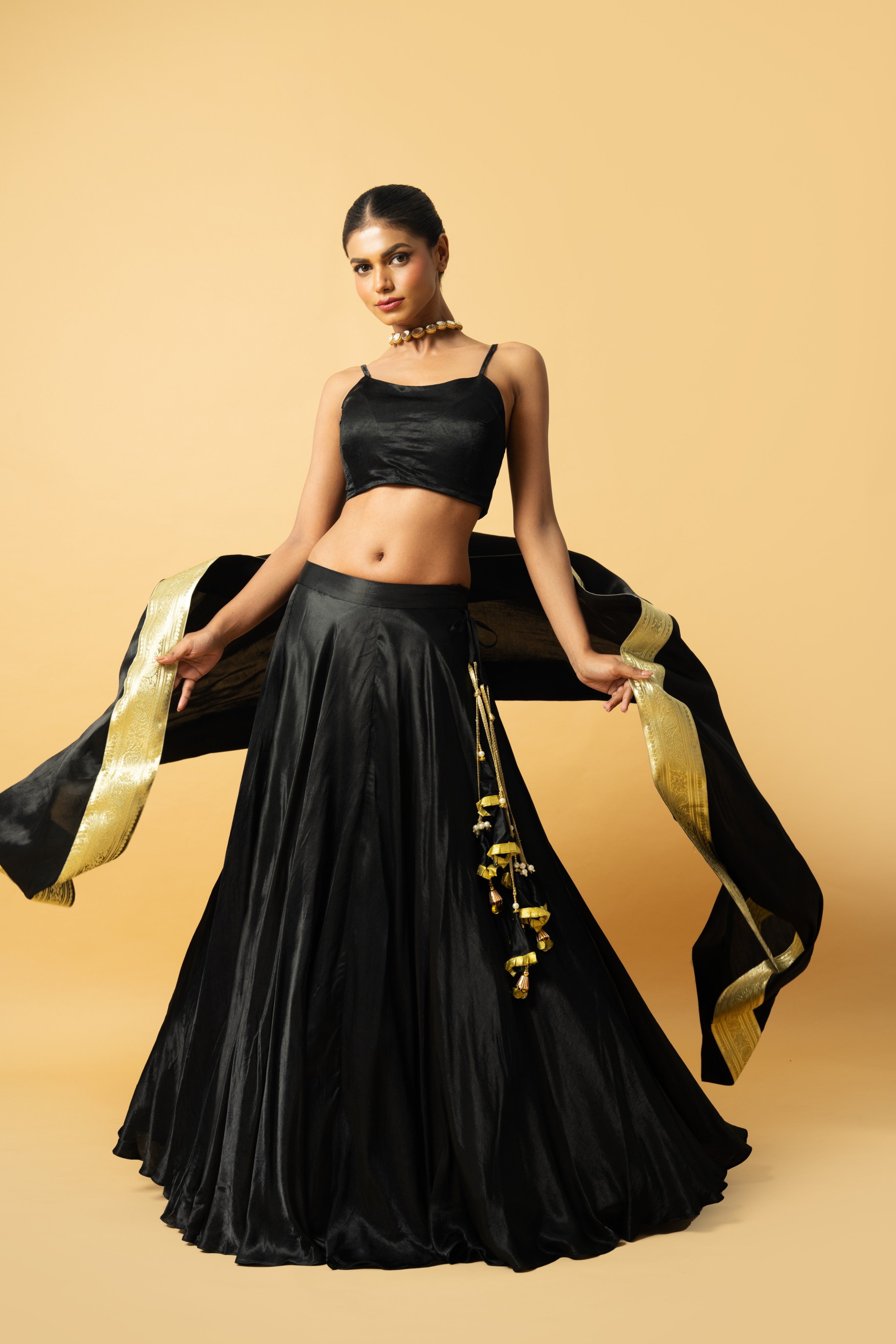 Black modal satin lehenga with golden lace in dupatta
