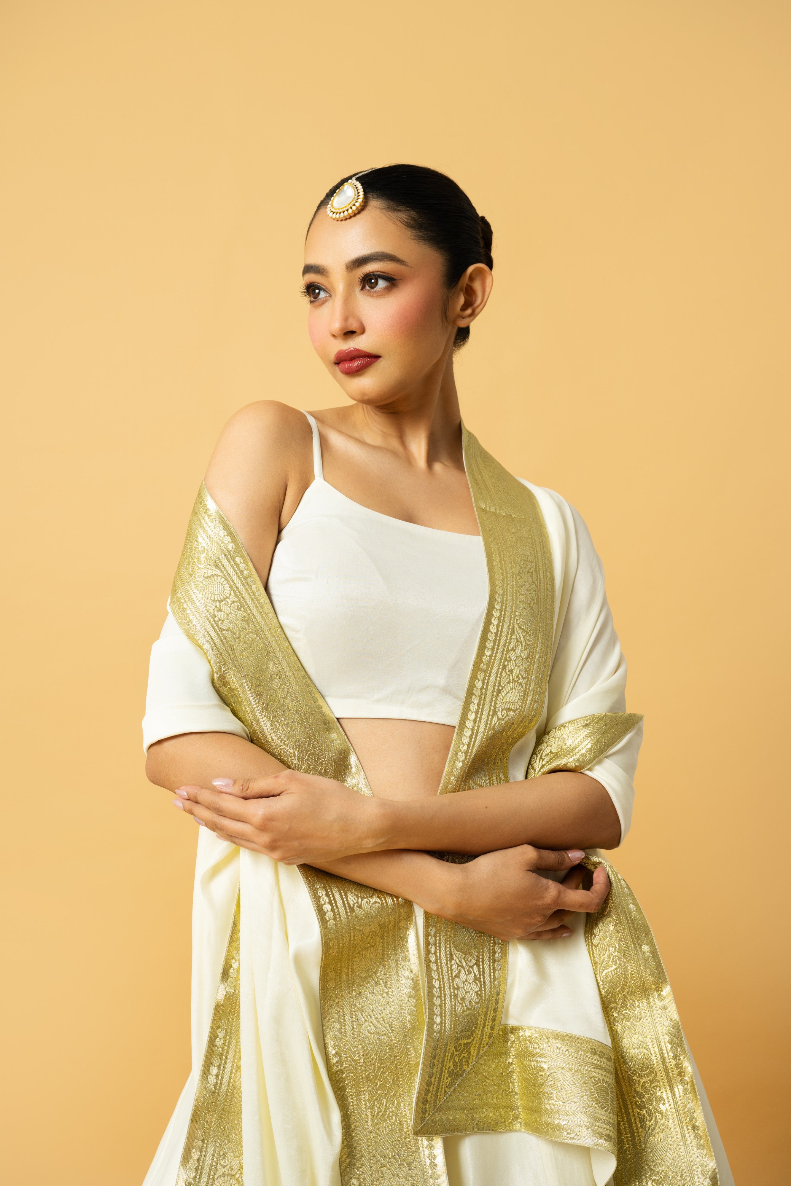 Ivory modal satin lehenga with golden lace in dupatta