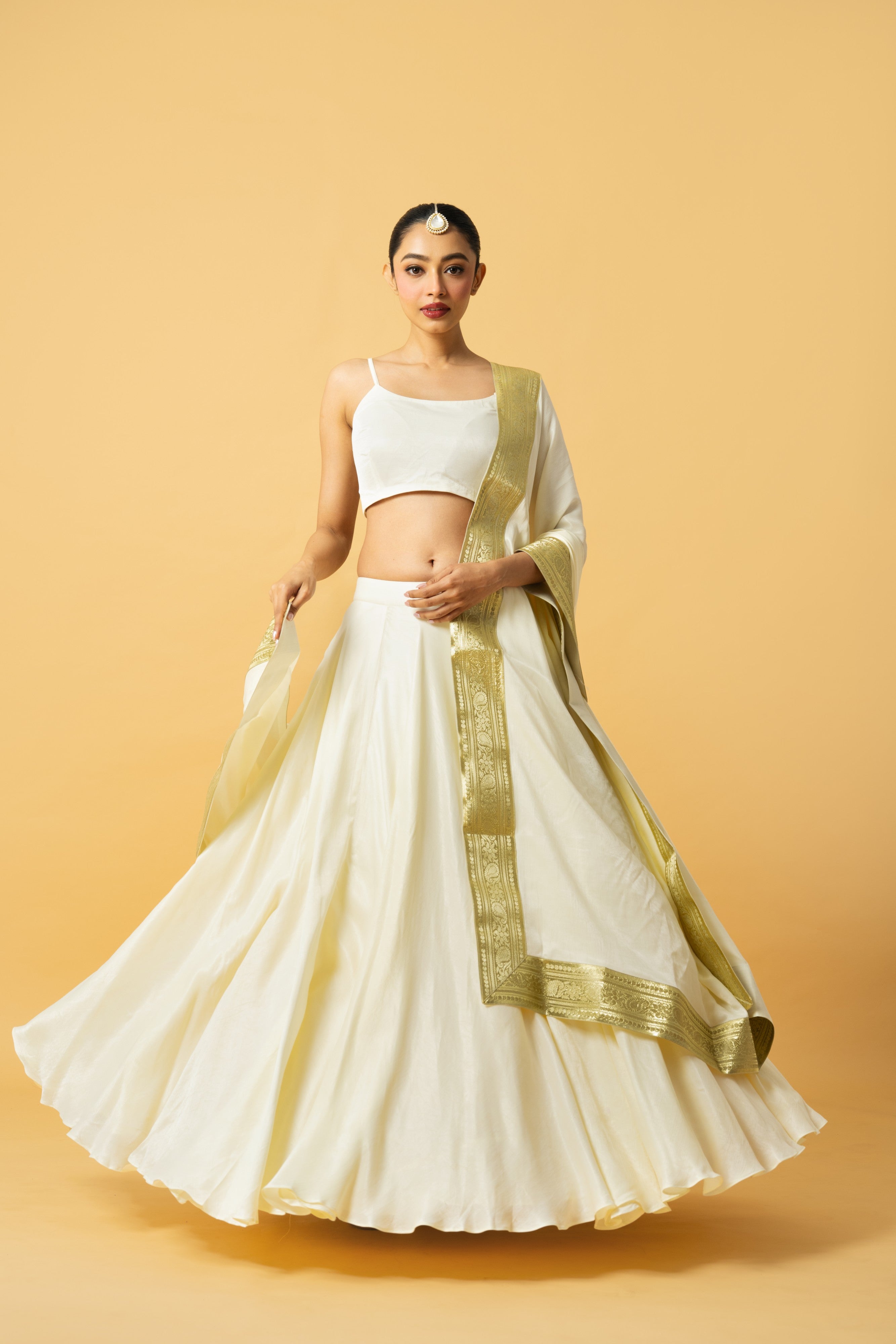 Ivory modal satin lehenga with golden lace in dupatta