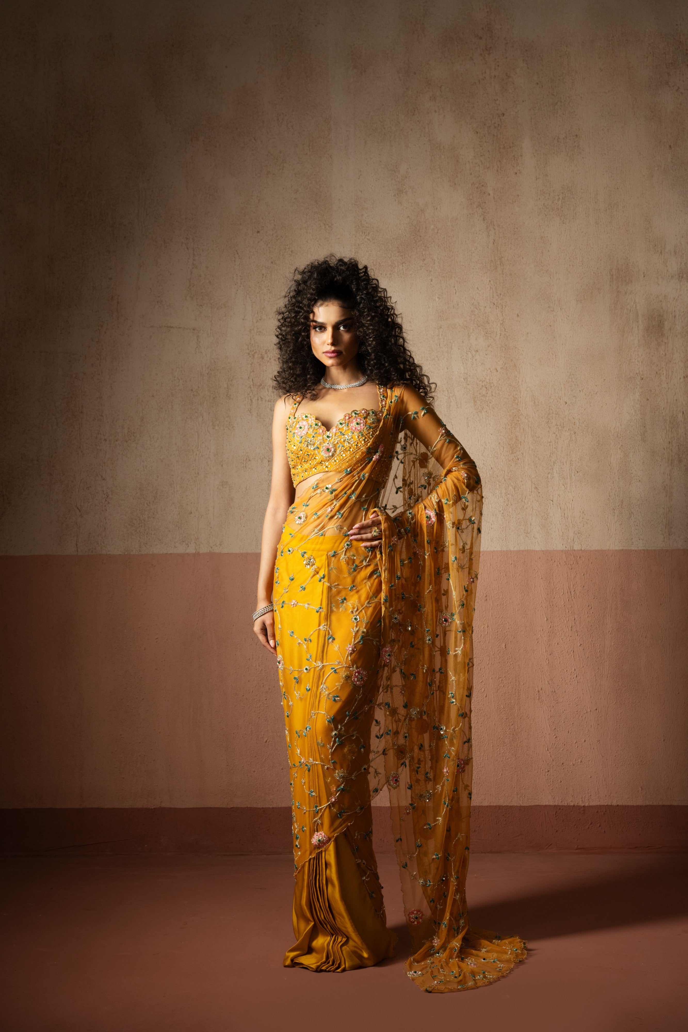 Predraped , mustard yellow , hand embroidered net & georgette saree