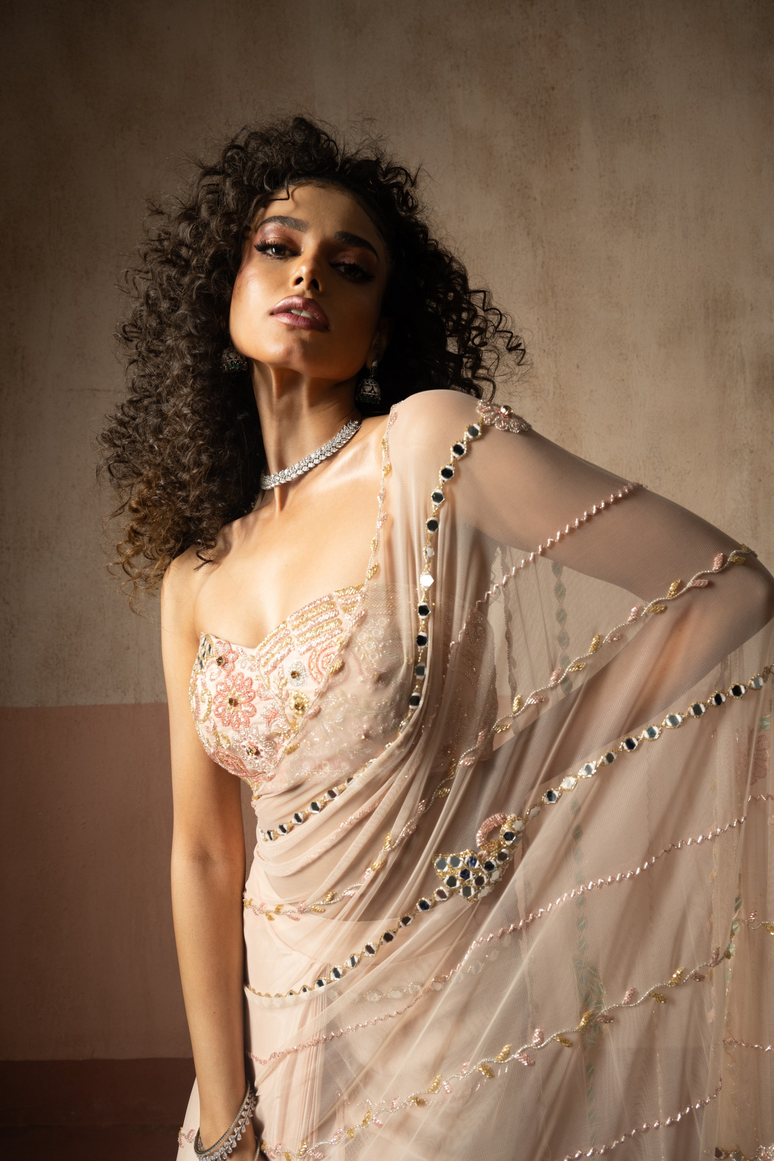 Predraped , baby pink ,  hand embroidered net & satin saree