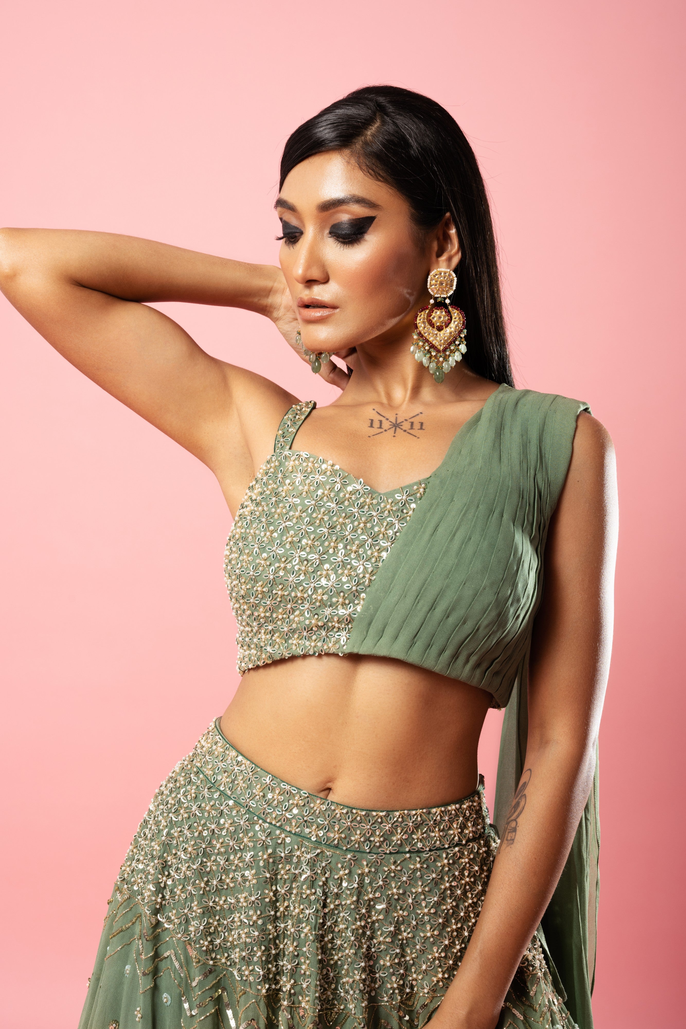 Sage green drape lehenga set