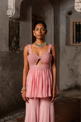 A thread work peplum set with sharara pants