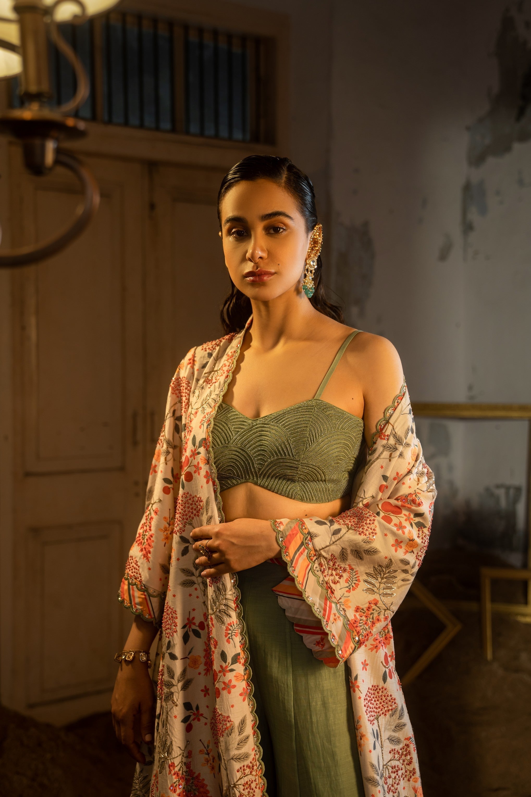 Floral printed jacket set with bustier and plazzo pants.