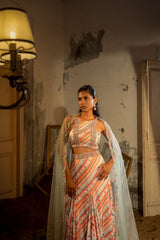 A hand embroidered lehenga set paired with blouse and duptta
