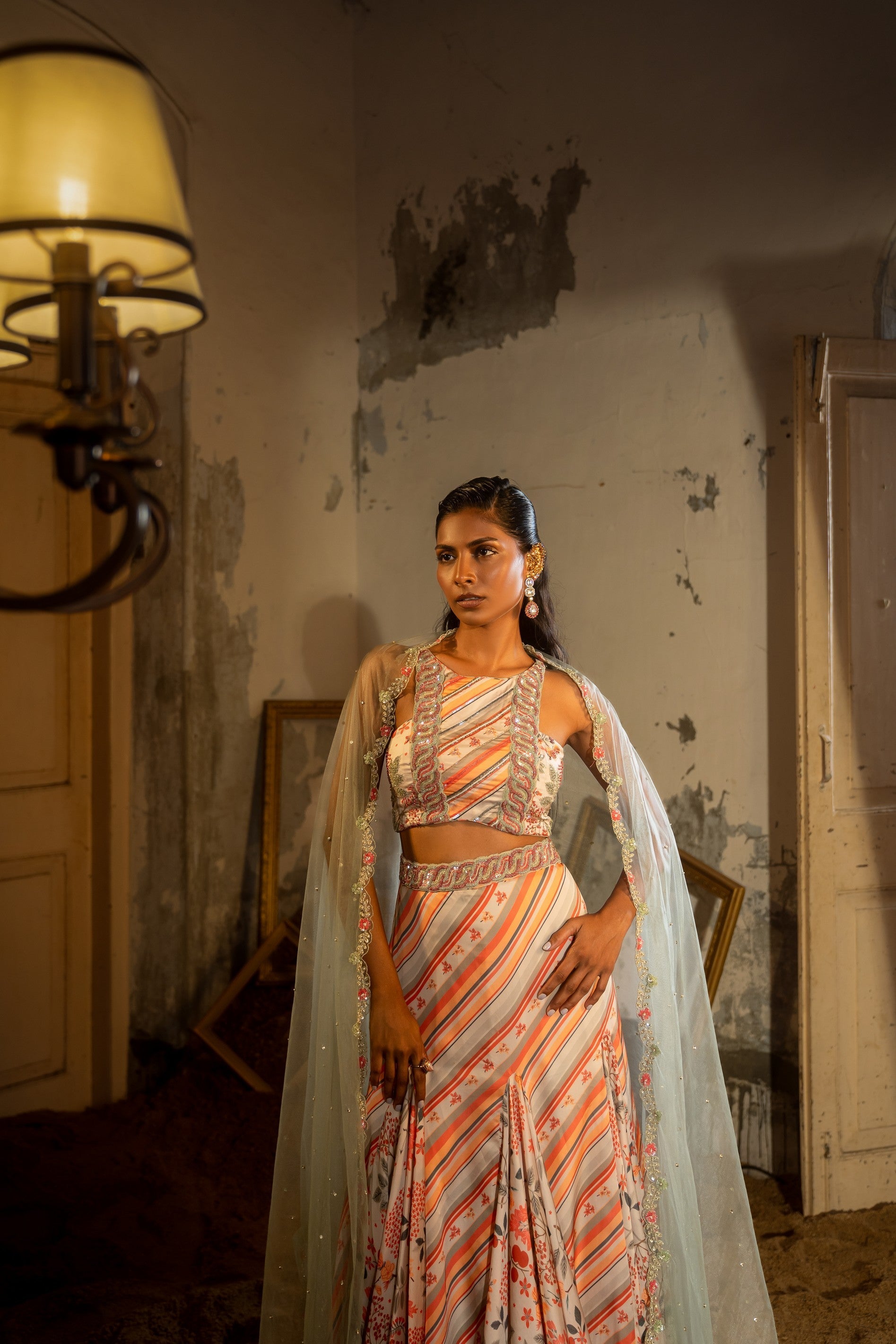 A hand embroidered lehenga set paired with blouse and duptta