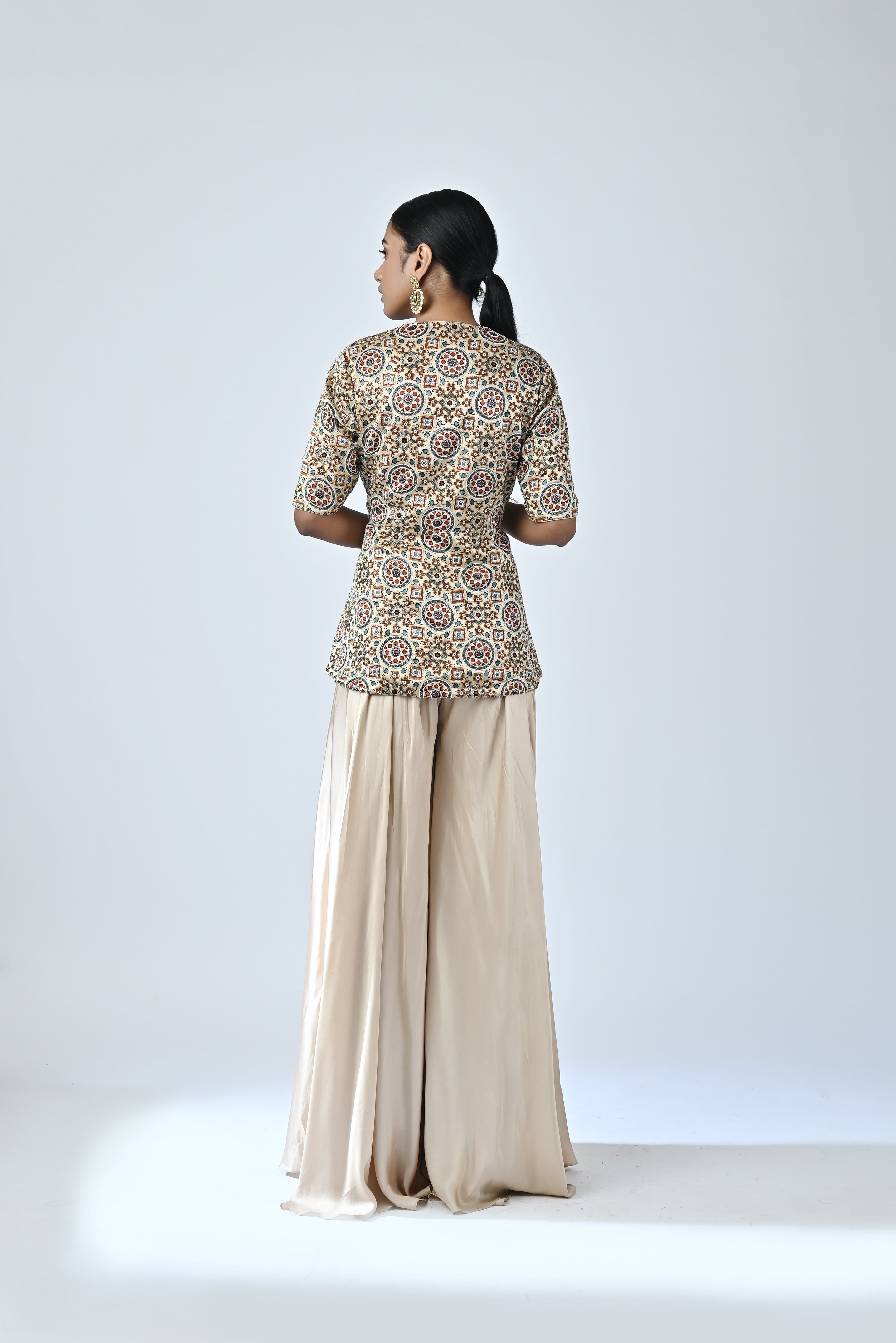 Ajrakh embroidered peplum top with flare pants