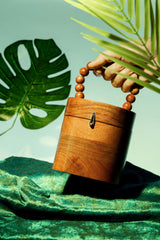 CHIC BUCKET BAG IN SHEESHAM WOOD